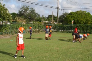 Here FYFL Pee wee/11U hurricanes learn about positions and assignments "Every kid learns every position Said Coach"