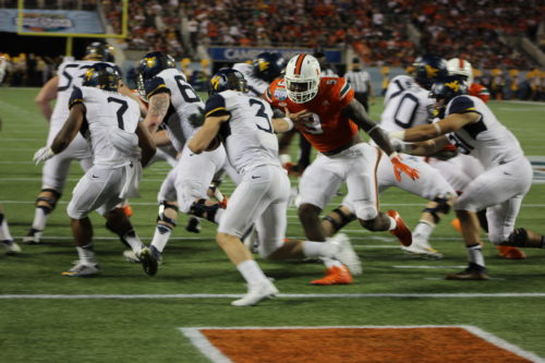 Miami defensive end Chad Thomas has his sights set on West Virginia quarterback Skyler Howard during the Dec. 28, 2016 Russell Athletic Bowl. Thomas finished with four tackles in the Hurricanes' 31-14 win.